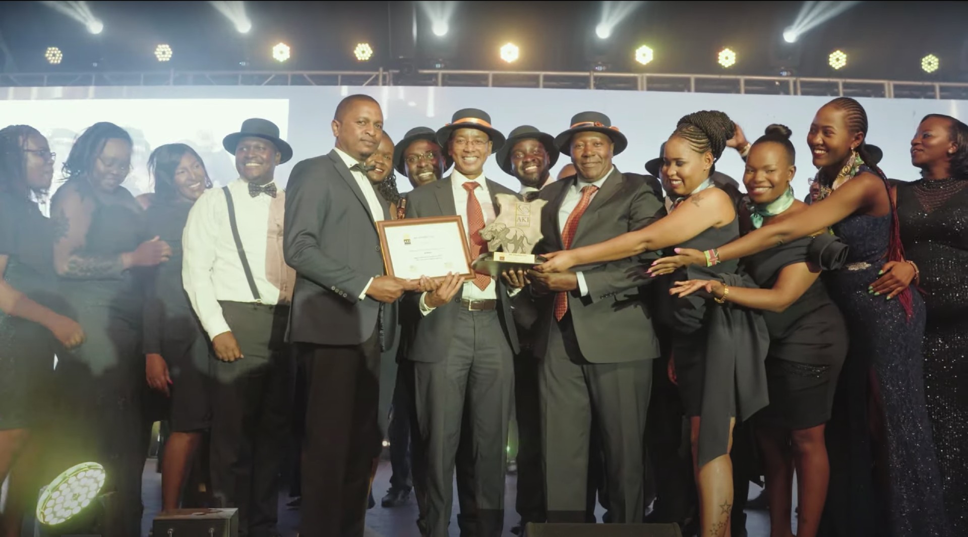 Madison group holding awards in a group at AKI awards 2023